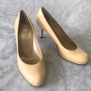 Stuart Weitzman size 9 pumps.  Light yellow